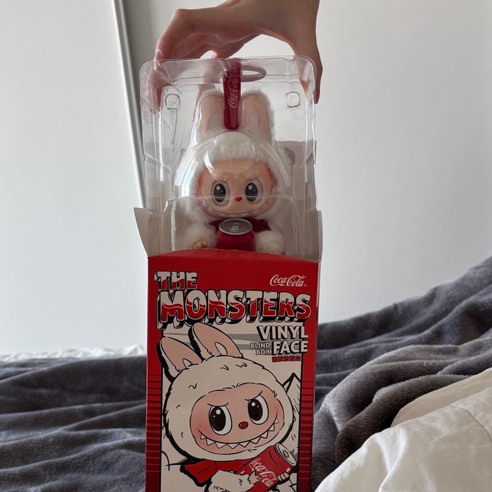Coca Cola The Monsters Vinyl Figure “HAPPY FACTOR”- Red and White Labubu
